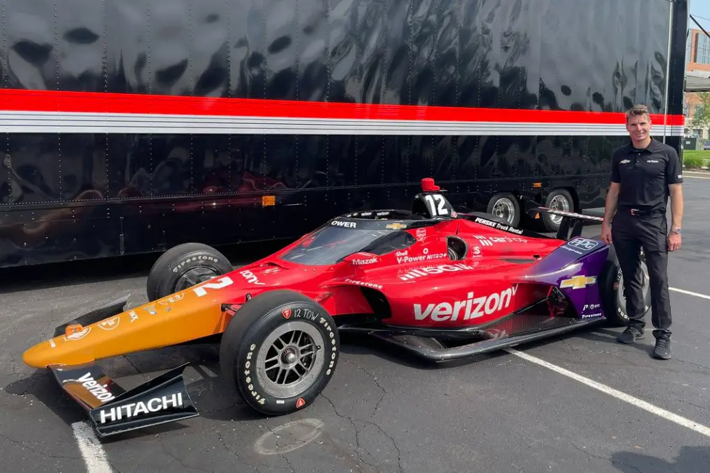 Power stands next to his special livery for the 106th Indy 500.