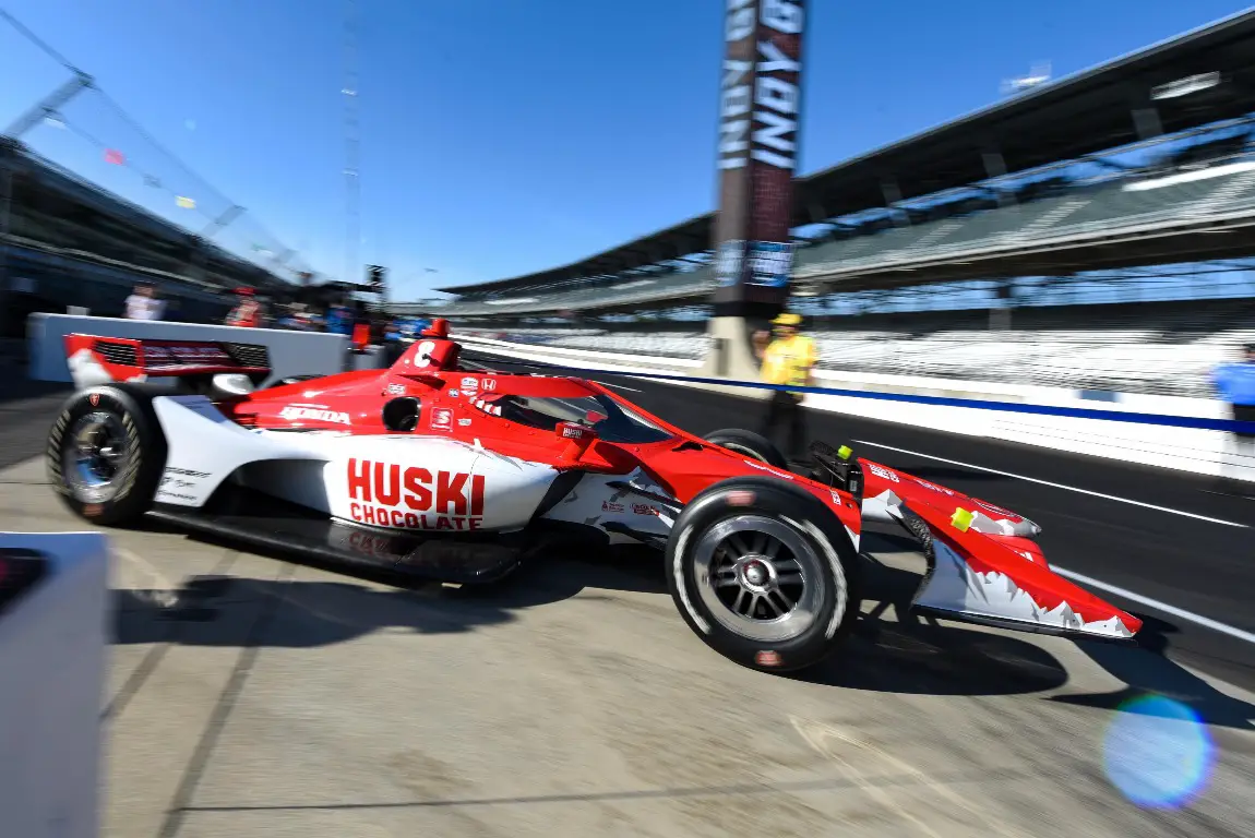 The No. 8 Chip Ganassi Racing Chevrolet being towed onto the Indianapolis Motor Speedway pit-road.
