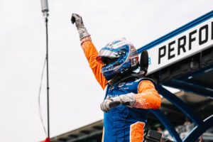 Scott Dixon celebrates capturing the pole for the 106th Indianapolis 500.