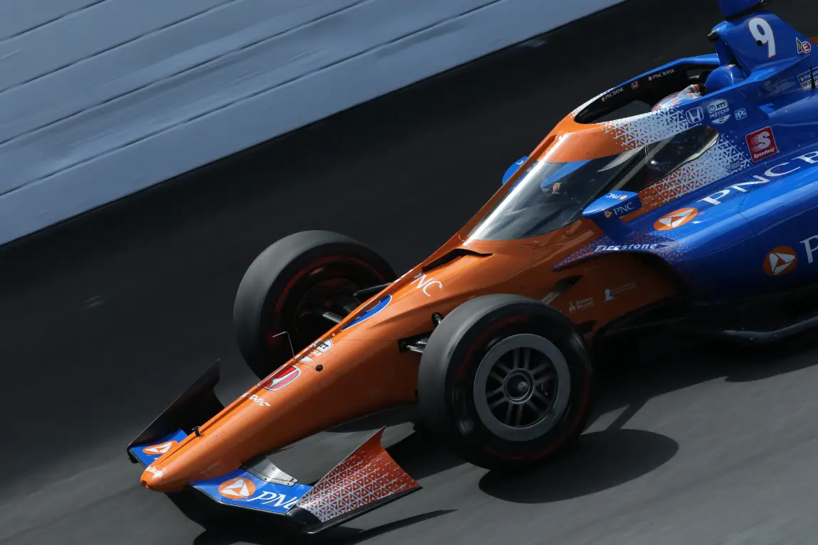 Scott Dixon surged to a historic run to win pole for the Indy 500.