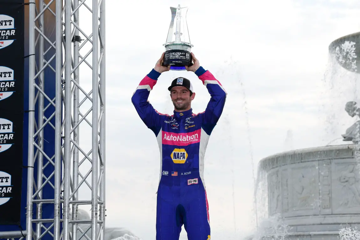 Alexander Rossi stands on the podium after finishing second in the Detroit Grand Prix.