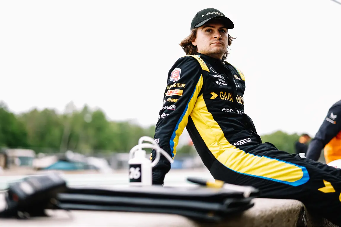 Colton Herta sits on the pit-wall at Road America.