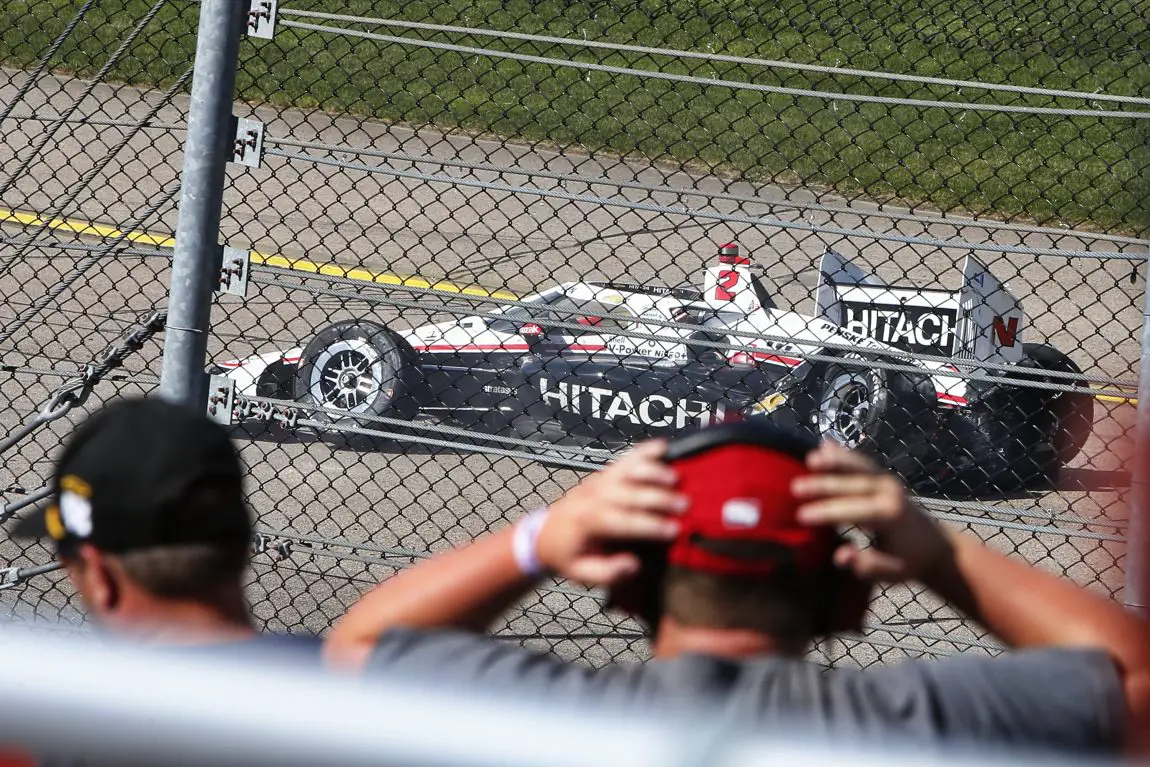 Josef Newgarden's crashed car sliding to a stop after the 2022 Hy-Vee Salute to Farmers 300 at Iowa Speedway.