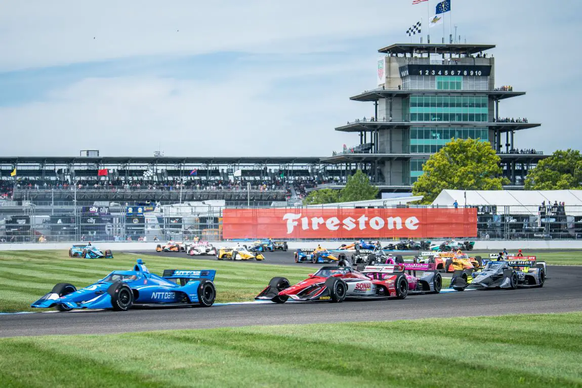 Alex Palou leads through Turn 8 of the IMS road course in 2021