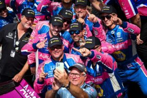 Alexander Rossi celebrates with his team at IMS