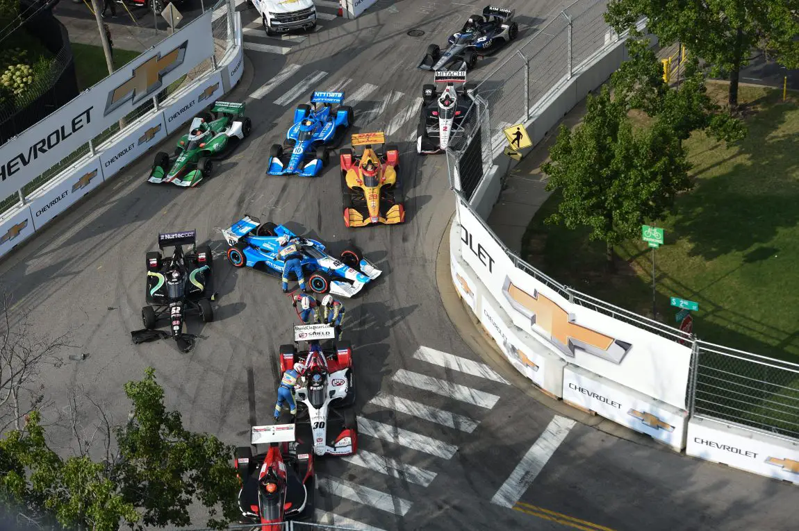 IndyCar drivers under the red flag after a chaotic restart in the 2021 IndyCar race on the streets of Nashville.