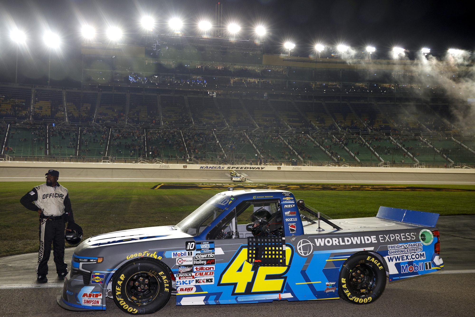 Carson Hocevar pulls his No. 42 Niece Motorsports Chevrolet Silverado on pit-road after the conclusion of the Kansas Lottery 200 from Kansas Speedway.