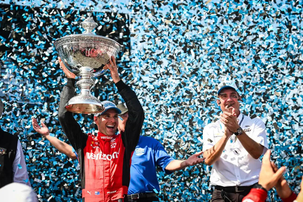 Will Power celebrates winning the 2022 NTT IndyCar Series championship.