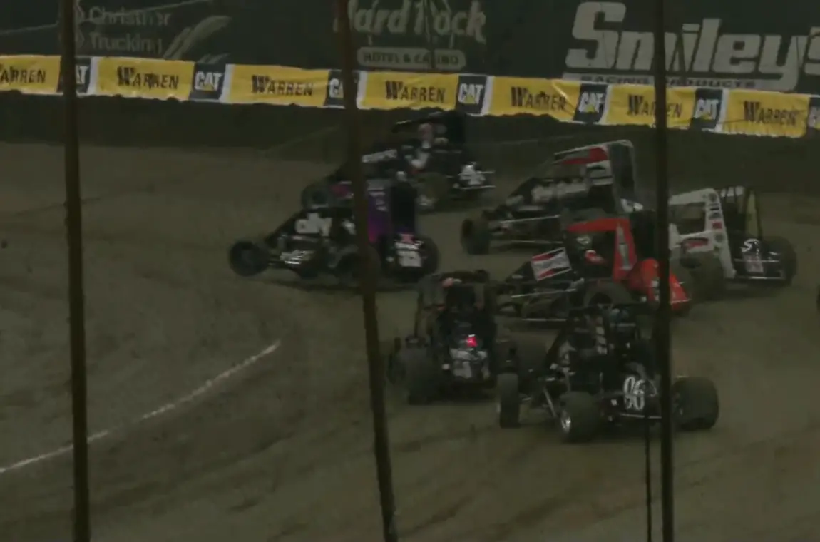 Alex Bowman making a big move in his Tuesday night qualifier at the 2023 Chili Bowl.