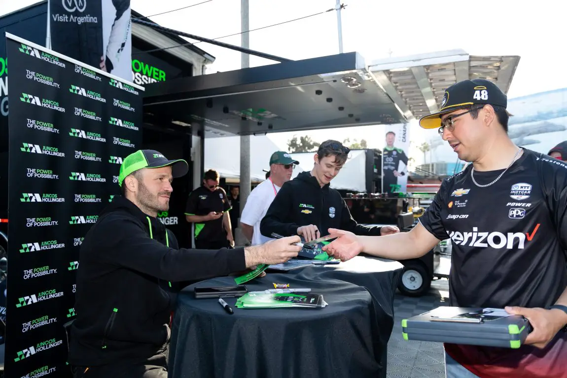 Agustin Canapino and Callum Ilott sign autographs at the 2023 Acura Grand Prix of Long Beach.