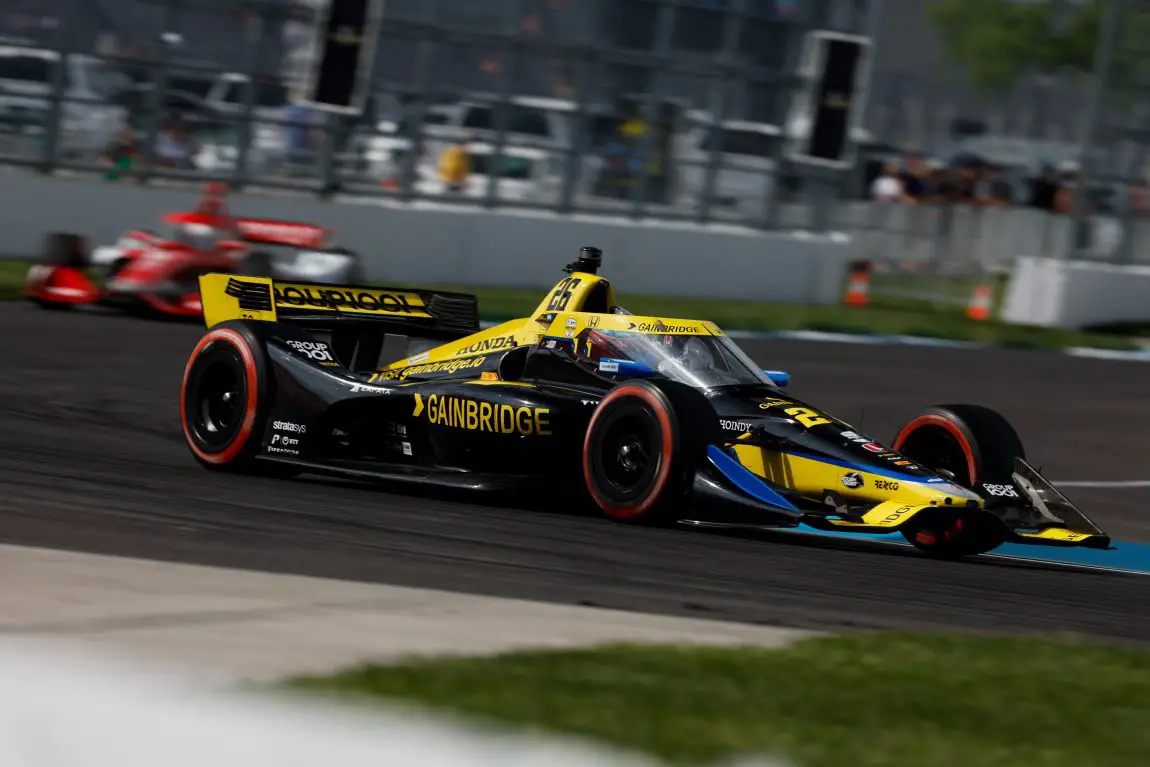 Colton Herta leads Marcus Ericsson in the 2023 GMR Grand Prix at the Indianapolis Motor Speedway road course.