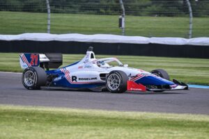Kyffin Simpson practices his No. 21 Indy NXT machine on the Indianapolis Motor Speedway road course.