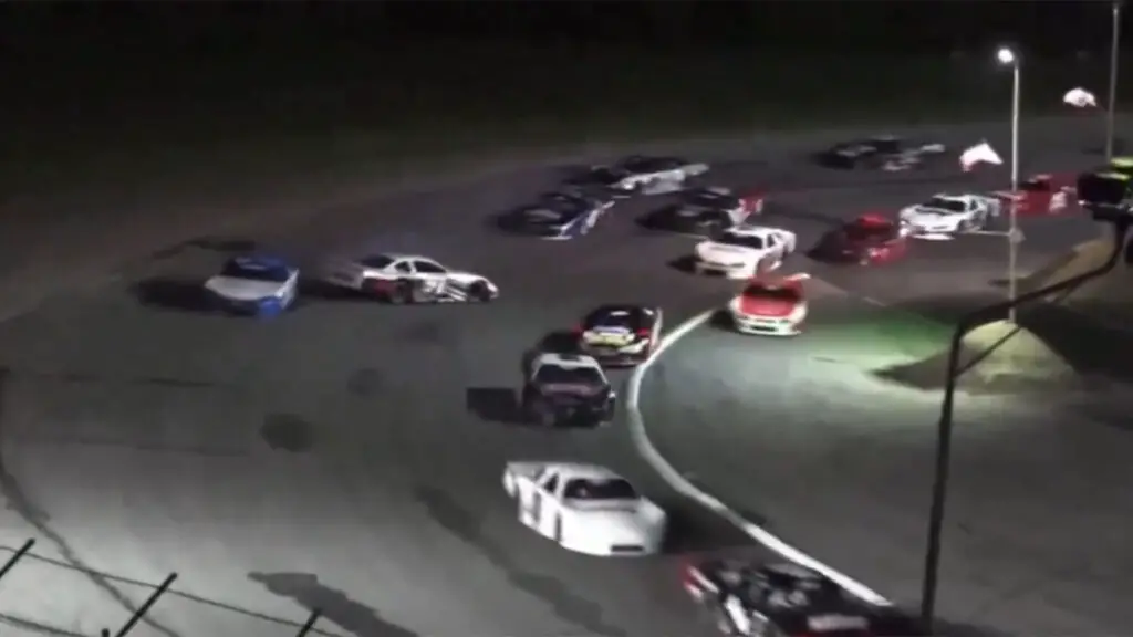 Kyle Busch spun out by Garrett Hall at Oxford Plains Speedway Celebration of America 300 PASS Super Late Models 2024