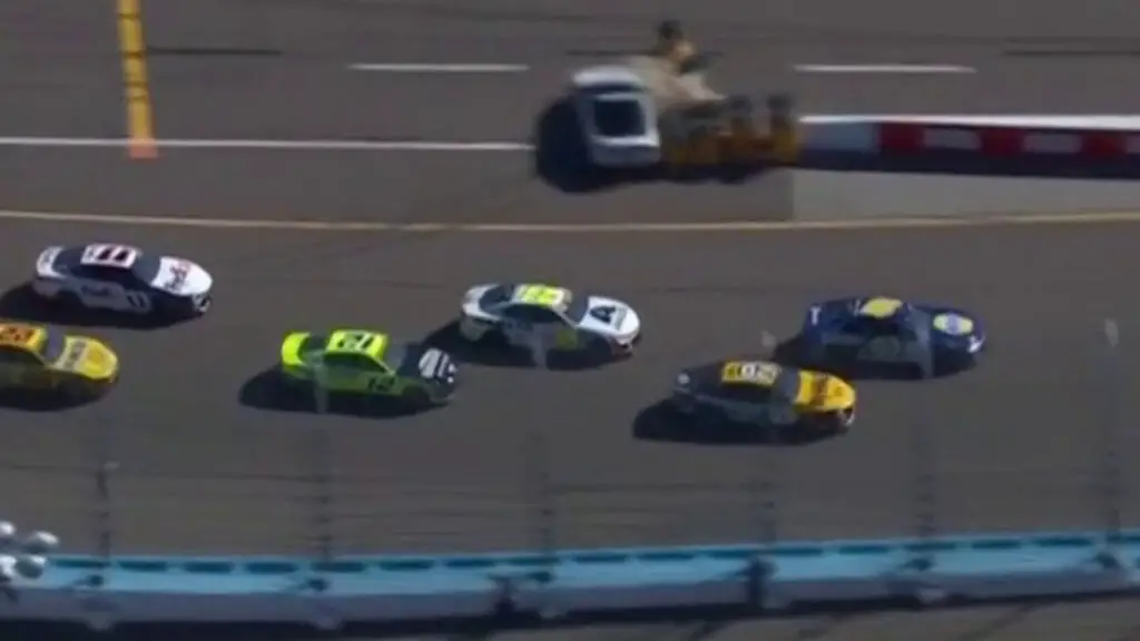 pace car crashes into sand barrels on pit road in NASCAR Cup Series Championship Race at Phoenix Raceway