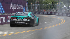 Katherine Legge bumps Corey Heim as she makes the field for NASCAR Cup Series Grant Park 165 at the Chicago Street Course.