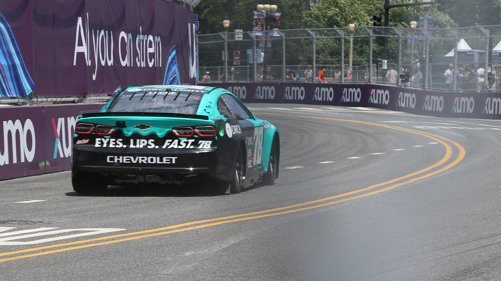 Katherine Legge bumps Corey Heim as she makes the field for NASCAR Cup Series Grant Park 165 at the Chicago Street Course.