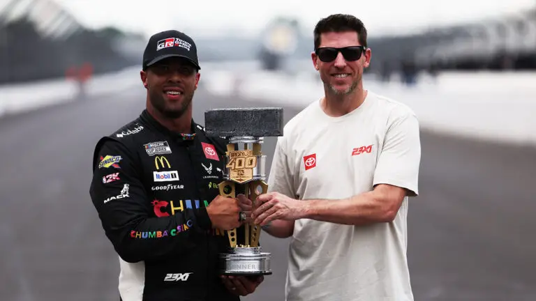 Denny Hamlin feels Bubba Wallace's Brickyard 400 win is the "next step," for the 23XI Racing team and shows that the team belongs in NASCAR.