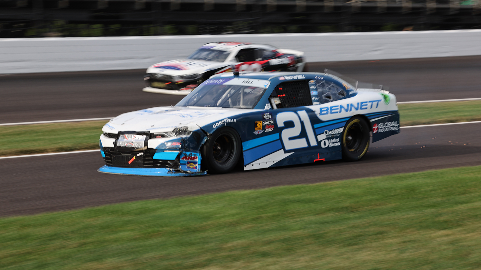 Will Austin Hill be suspended for intentionally crashing Aric Almirola in the NASCAR Xfinity Series race at Indianapolis Motor Speedway?