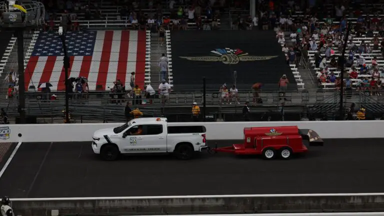Brickyard 400 red flagged for rain with four laps left, Bubba Wallace leading