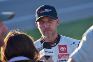 Denny Hamlin answers questions from the media after a disappointing runner-up finish at Kansas.