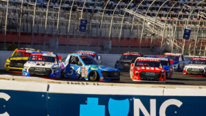Layne Riggs spins after contact from Grant Enfinger on the opening lap of the NASCAR Truck race at the Charlotte Roval