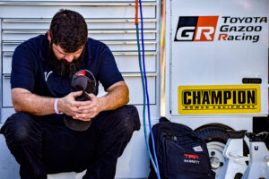 A Venturini Motorsports team member attempts to collect his thoughts on an emotional weekend at the LVMS Bull Ring.