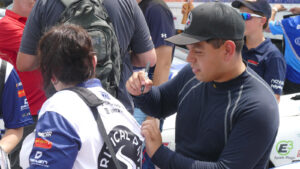 Ryan Vargas signs autographs ahead of a 2025 NASCAR Canada Series event at Calabogie.