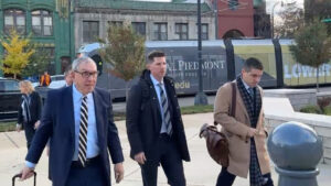 Denny Hamlin heads into the court on the opening day of the antitrust lawsuit against NASCAR