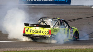 Corey Heim celebrates a win in the NASCAR Craftsman Truck Series Black's Tire 200 at Rockingham Speedway.