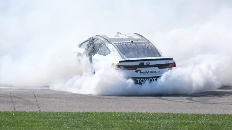 Tyler Reddick celebrates a win in the AdventHealth 400 at Kansas Speedway