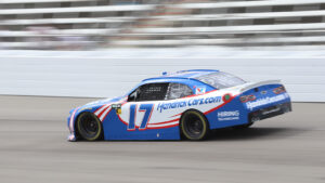 Corey Day secured his first career NASCAR O'Reilly Auto Parts Series pole on Friday at Rockingham Speedway.