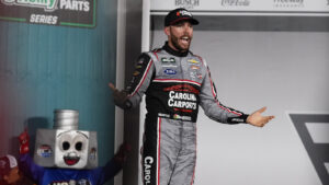 Ross Chastain claimed a rain-shortened victory in the NASCAR O'Reilly Auto Parts Series Charbroil 300 at Charlotte Motor Speedway