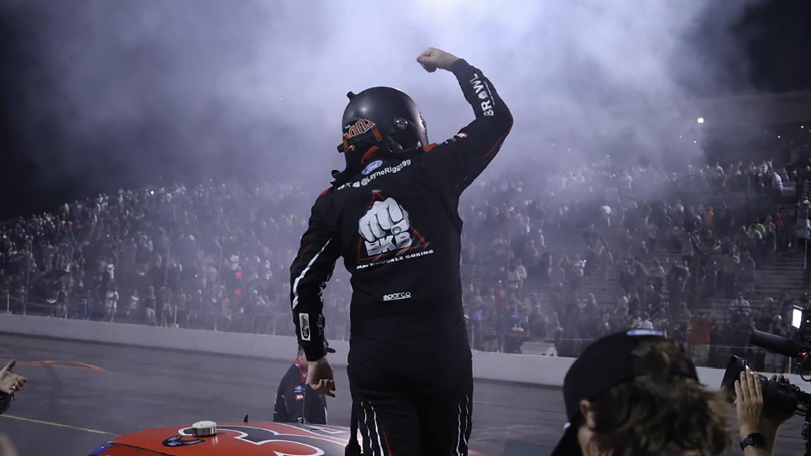 Layne Riggs celebrates a win in the TSport 200 NASCAR Craftsman Truck Series race at Lucas Oil Indianapolis Raceway Park