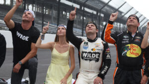 Carson Kvapil celebrates his first career NASCAR O'Reilly Auto Parts Series in the Pennzoil 250 at Indianapolis Motor Speedway.
