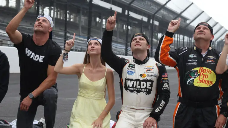 Carson Kvapil celebrates his first career NASCAR O'Reilly Auto Parts Series in the Pennzoil 250 at Indianapolis Motor Speedway.