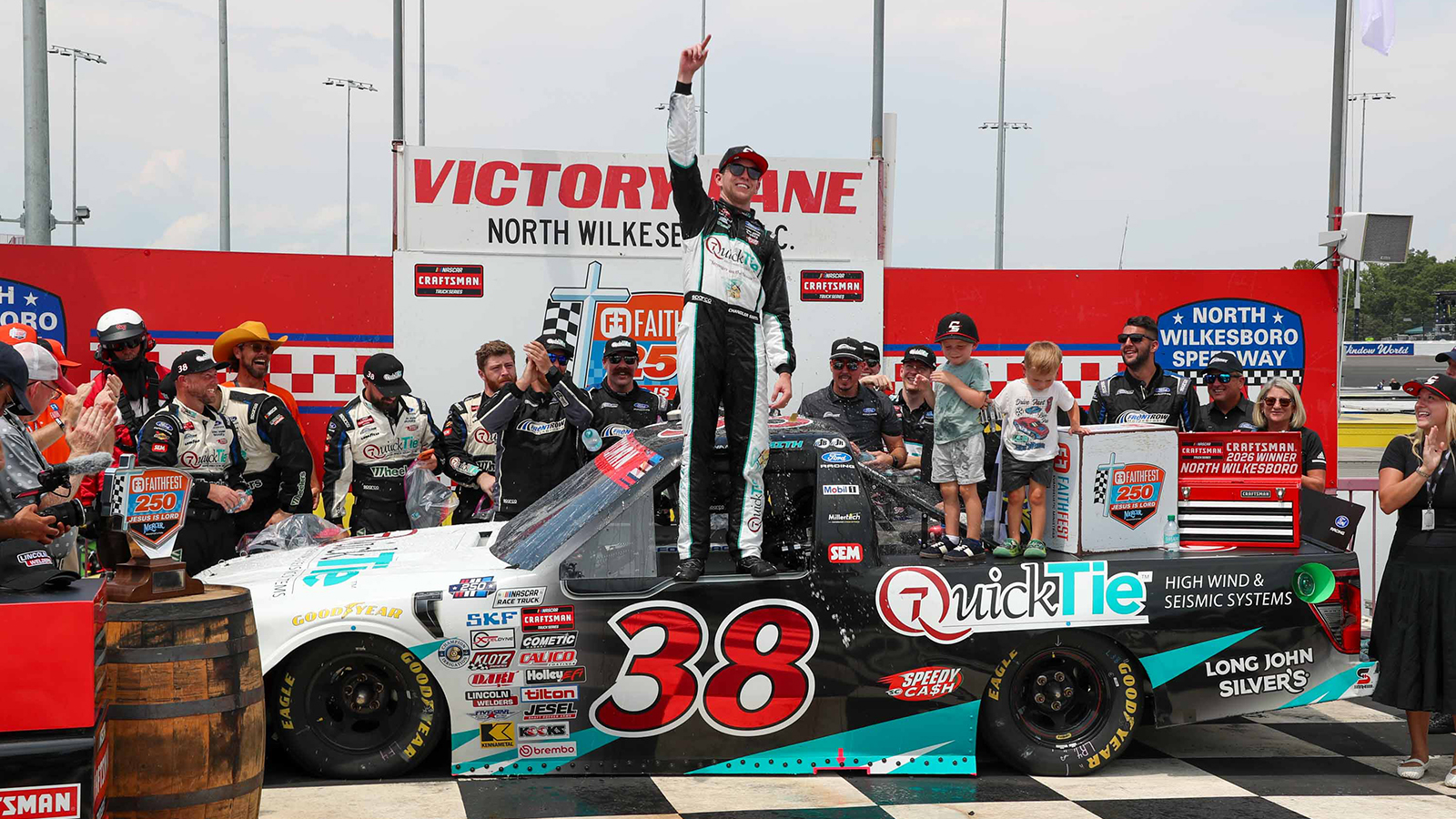 Chandler Smith celebrates a win in the Faith Fest 250 at North Wilkesboro Speedway.