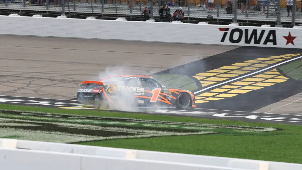 Carson Kvapil celebrates a win in the Hy-Vee Perks 250 NASCAR O'Reilly Auto Parts Series race at Iowa Speedway