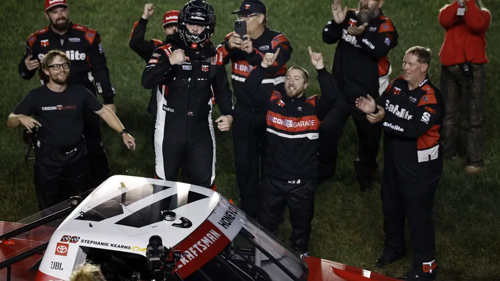 Kaden Honeycutt and his team celebrate a win in the Race to Stop Suicide 200 at Kansas Speedway