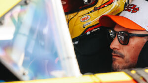 Joey Logano is on the pole for the Hollywood Casino 400 at Kansas after rain wiped out practice and qualifying.