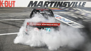 Chandler Smith celebrates a win in the Black's Tire 200 at Martinsville Speedway.