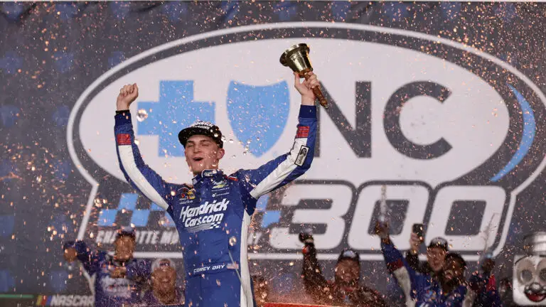 Corey Day celebrates a win in the 2026 Blue Cross NC 300 at Charlotte Motor Speedway.