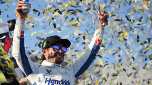 Kyle Larson celebrates a win in the YellaWood 500 at Talladega Superspeedway.