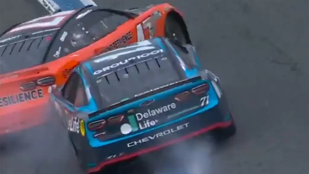 Michael McDowell spins out Ricky Stenhouse Jr. after the checkered flag in the Bank of America 400 at Charlotte Motor Speedway.