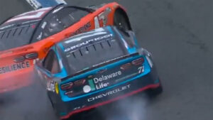 Michael McDowell spins out Ricky Stenhouse Jr. after the checkered flag in the Bank of America 400 at Charlotte Motor Speedway.